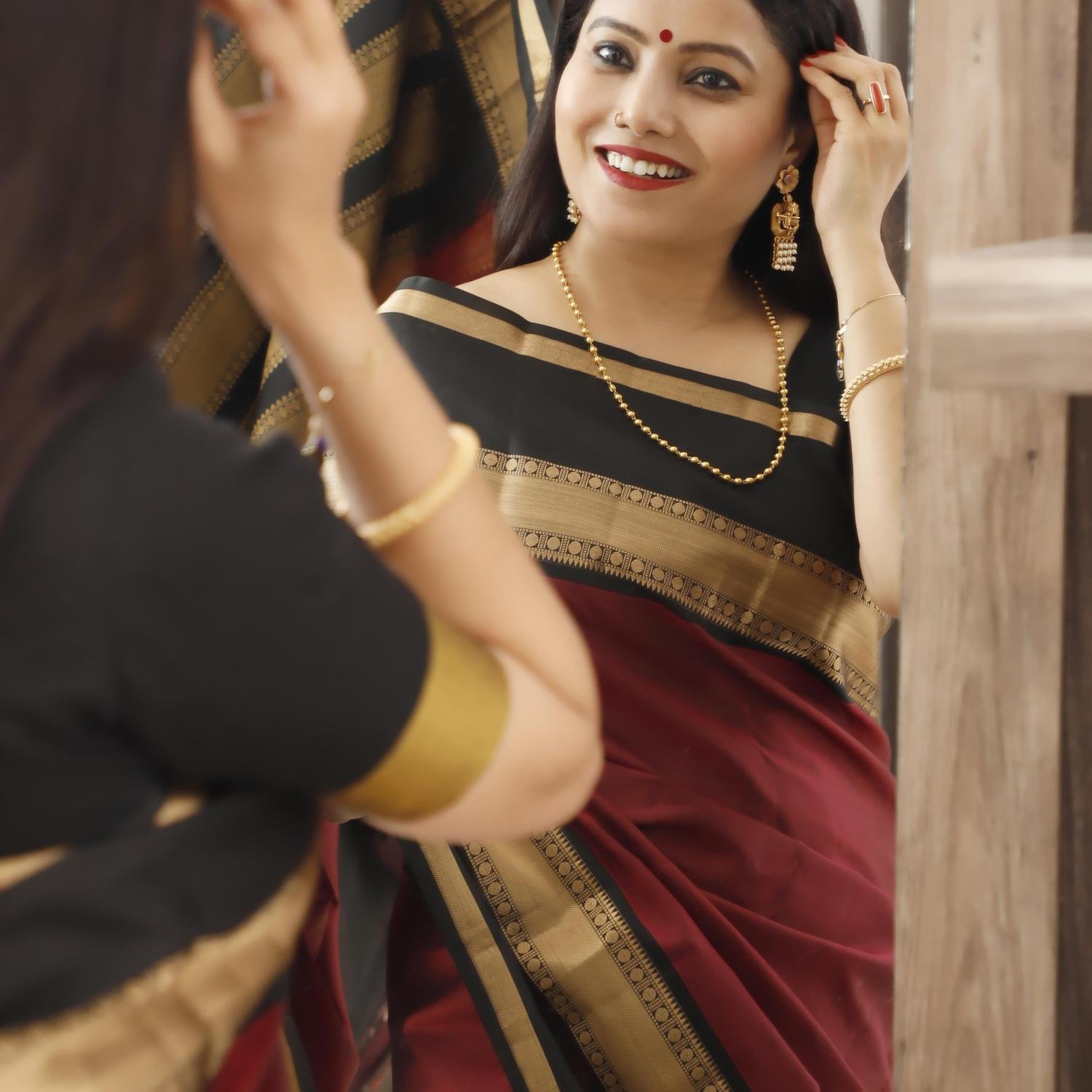 Handwoven Maroon & Black Kanchipuram Silk Saree with Gold Zari Border