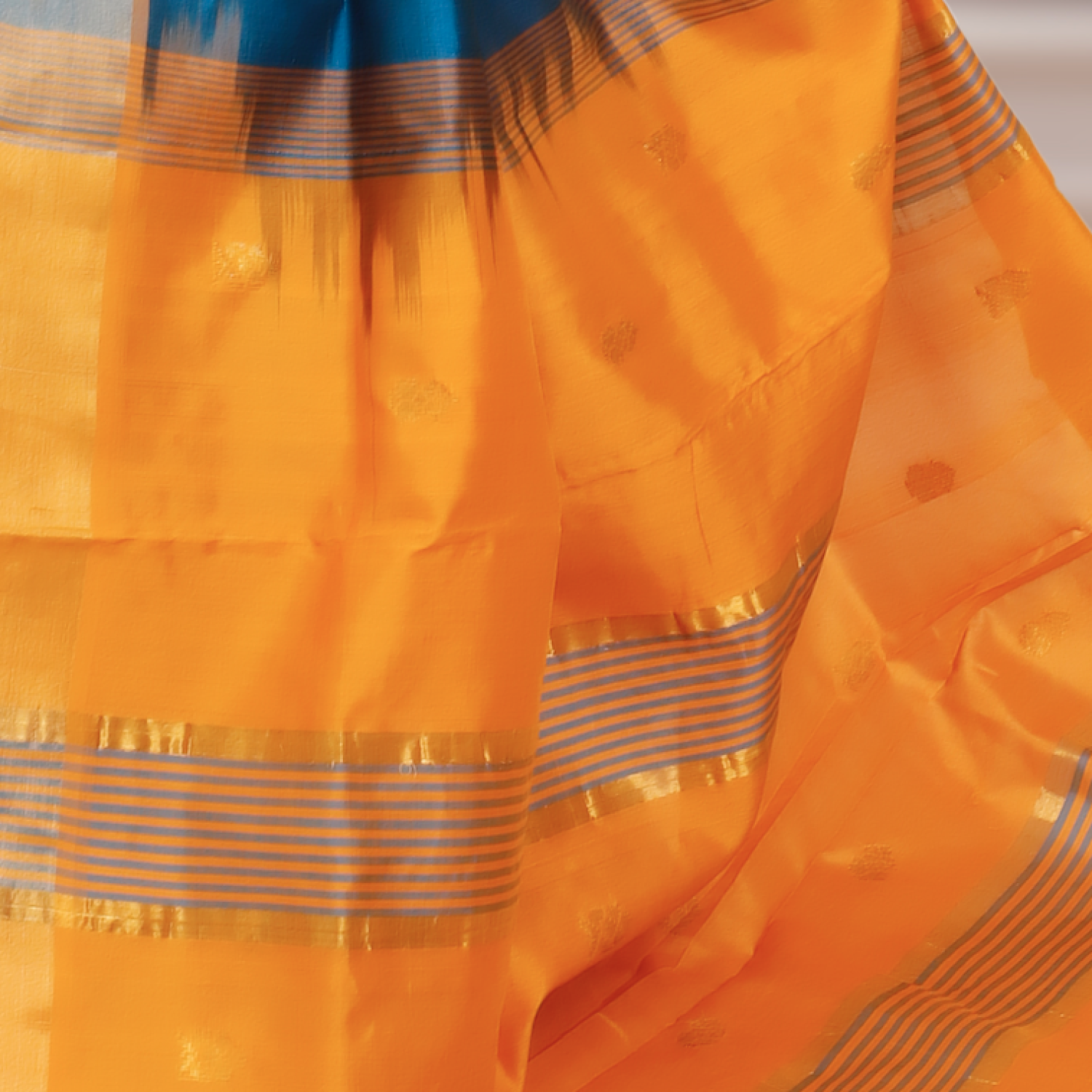 Kanchi Silk Cotton Saree – Blue Body with Orange Pallu & Golden Zari Border